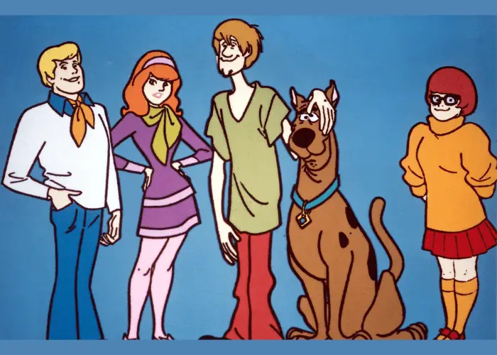 scooby doo's fictional characters cast on dark blue background